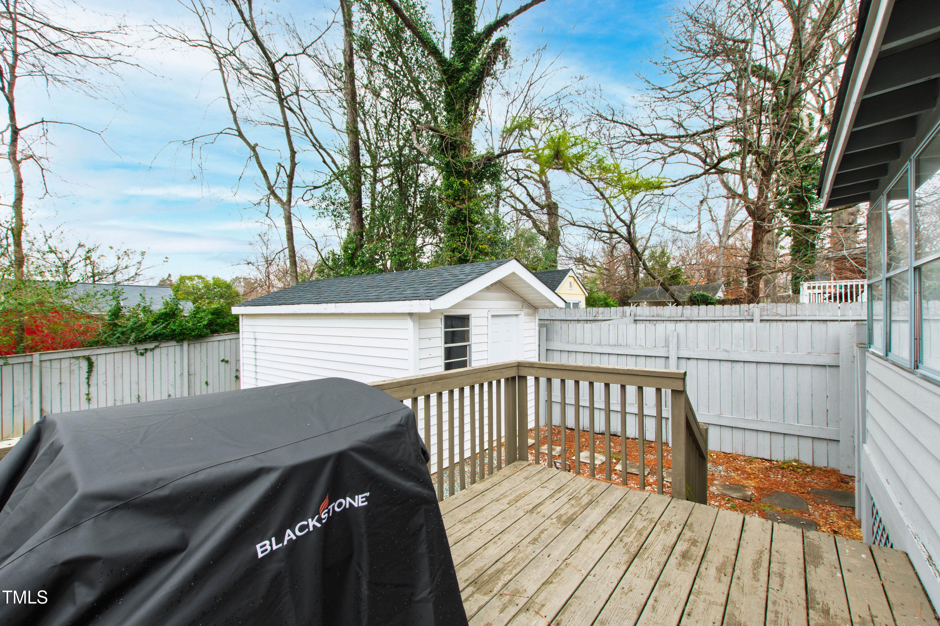 1817 Rankin Street Raleigh, NC 27604 - Photo 25 of 31 a view of a wooden deck and a patio