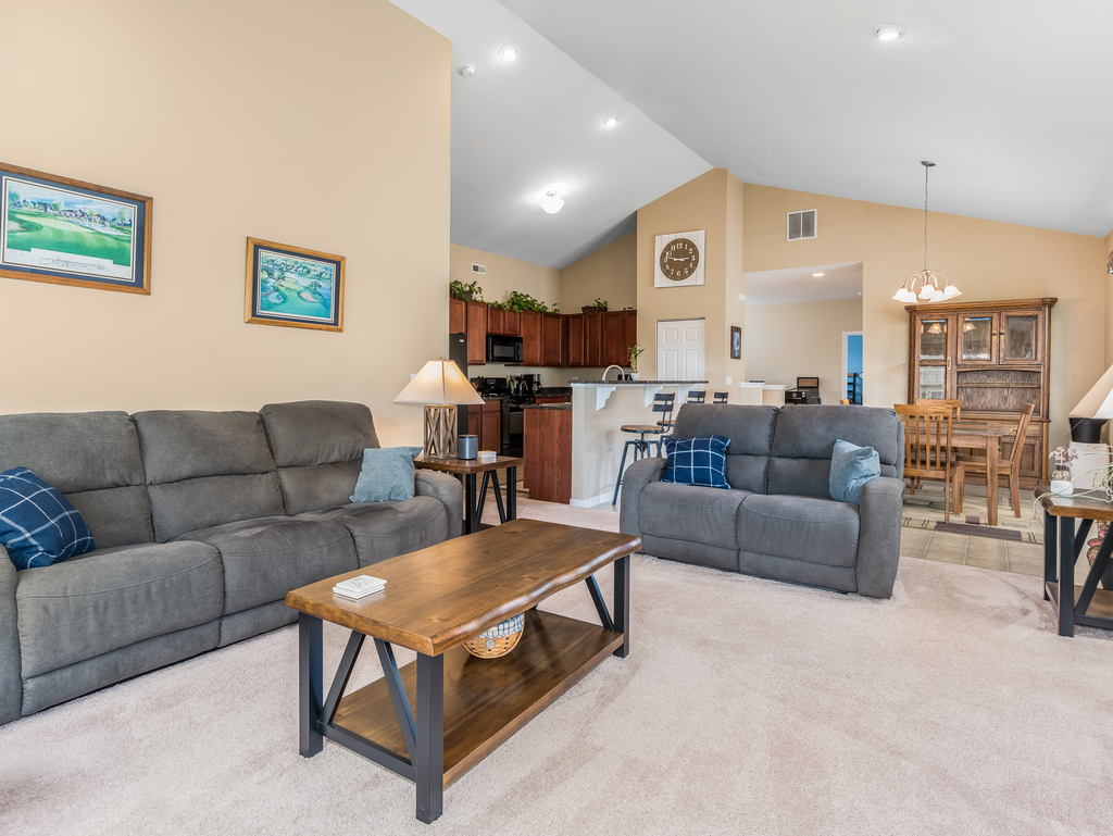 1927 Chase Lane, Unit 1927 Aurora, IL 60502 - Photo 13 of 24 a living room with furniture and a table