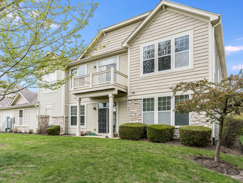 1927 Chase Lane, Unit 1927 Aurora, IL 60502 - Photo 24 of 24 a view of a yard in front of a house