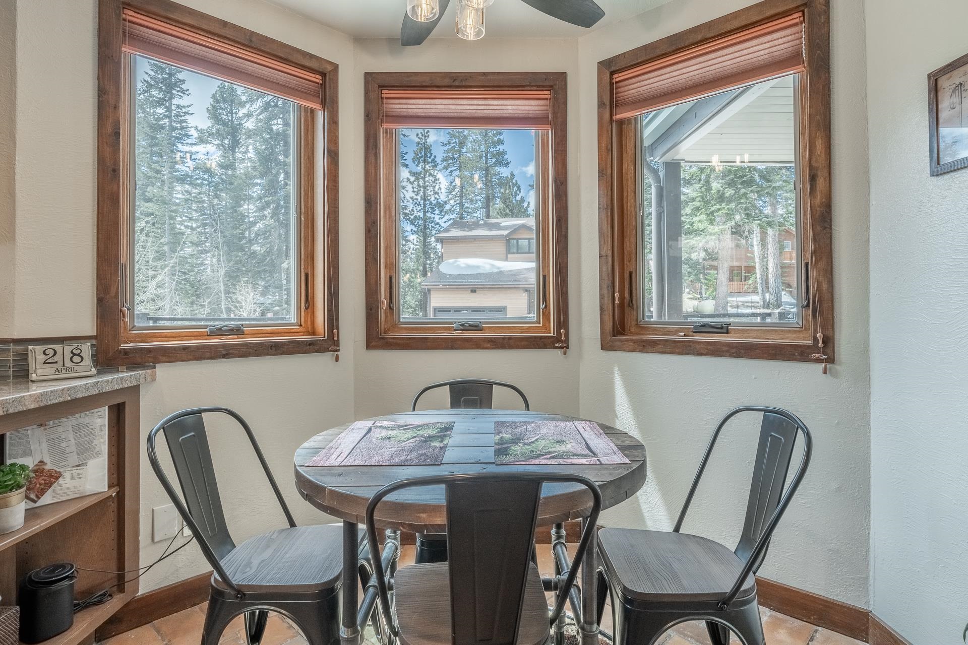 139 Ridgecrest Drive Mammoth Lakes, CA 93546 - Photo 19 of 65 Breakfast nook featuring multiple windows with wood frames and blinds