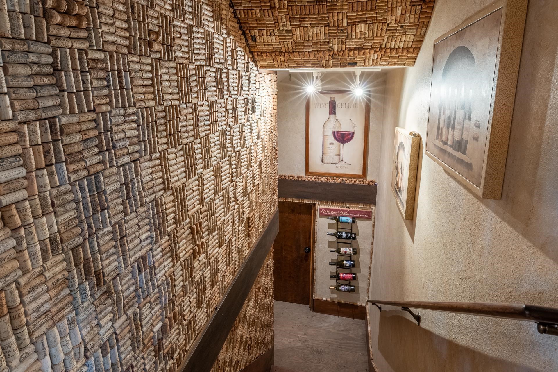 139 Ridgecrest Drive Mammoth Lakes, CA 93546 - Photo 22 of 65 Distinctive wall and ceiling treatment featuring wine corks, integrated with a built-in wine rack
