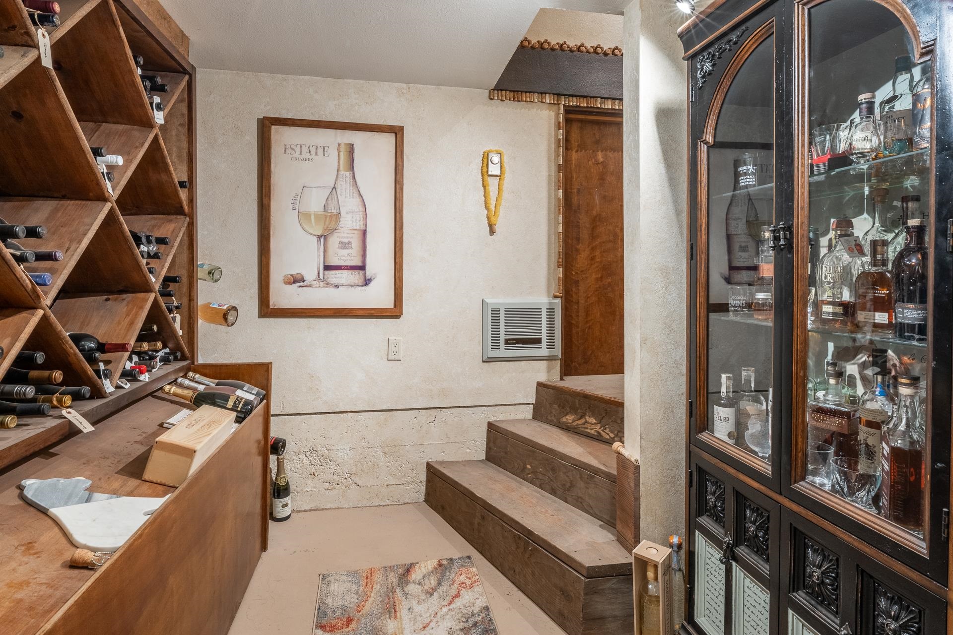 139 Ridgecrest Drive Mammoth Lakes, CA 93546 - Photo 23 of 65 Dedicated wine storage area featuring wood-finish racks and an integrated wood-finish counter
