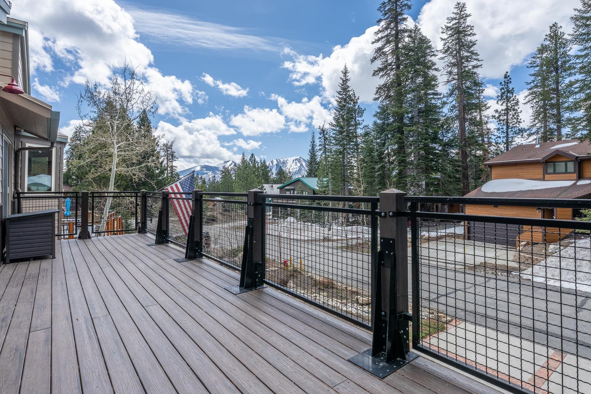 139 Ridgecrest Drive Mammoth Lakes, CA 93546 - Photo 34 of 65 Spacious outdoor deck featuring composite decking and a black metal railing system