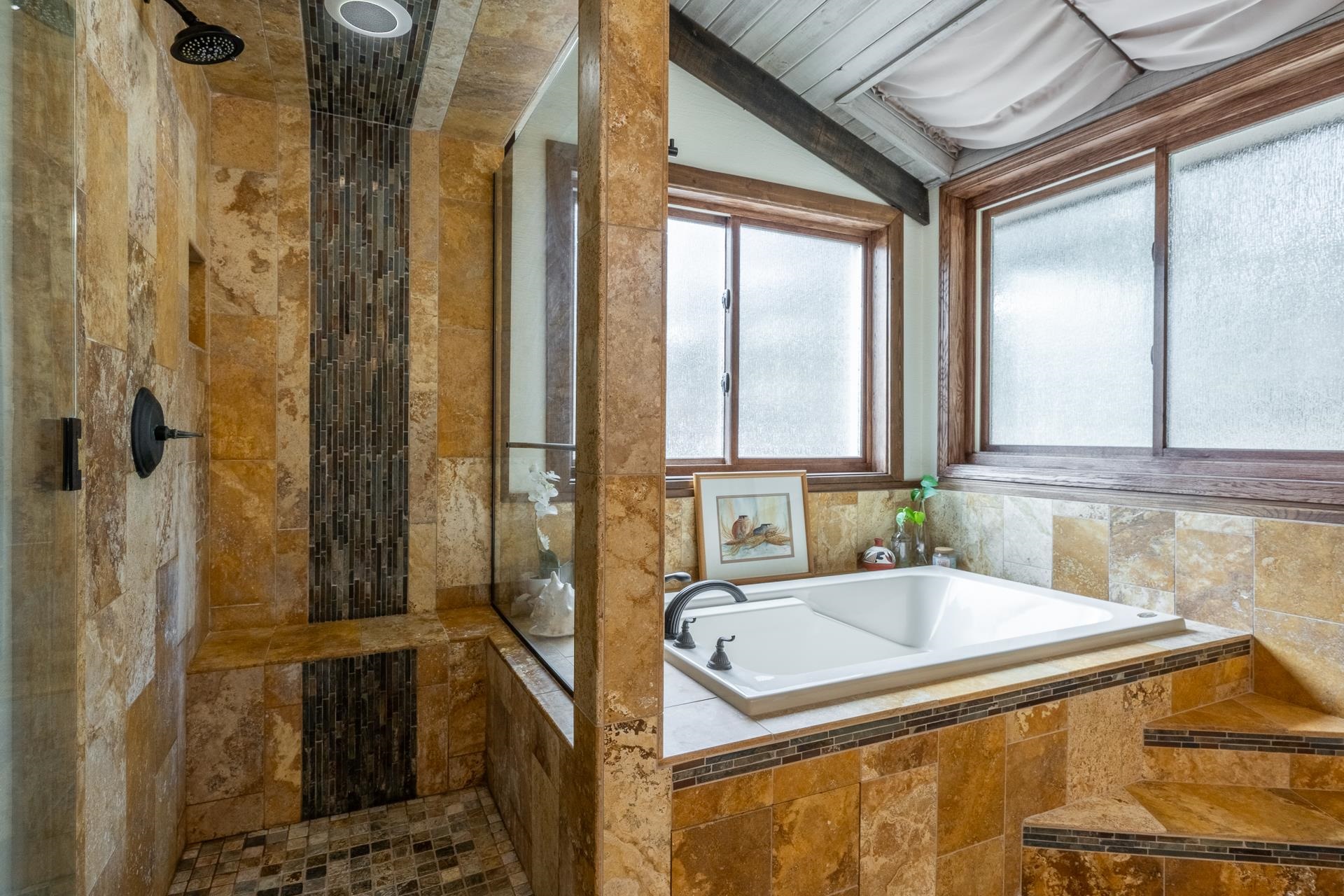 139 Ridgecrest Drive Mammoth Lakes, CA 93546 - Photo 39 of 65 Integrated soaking tub and walk-in shower featuring natural stone tile work, glass enclosure