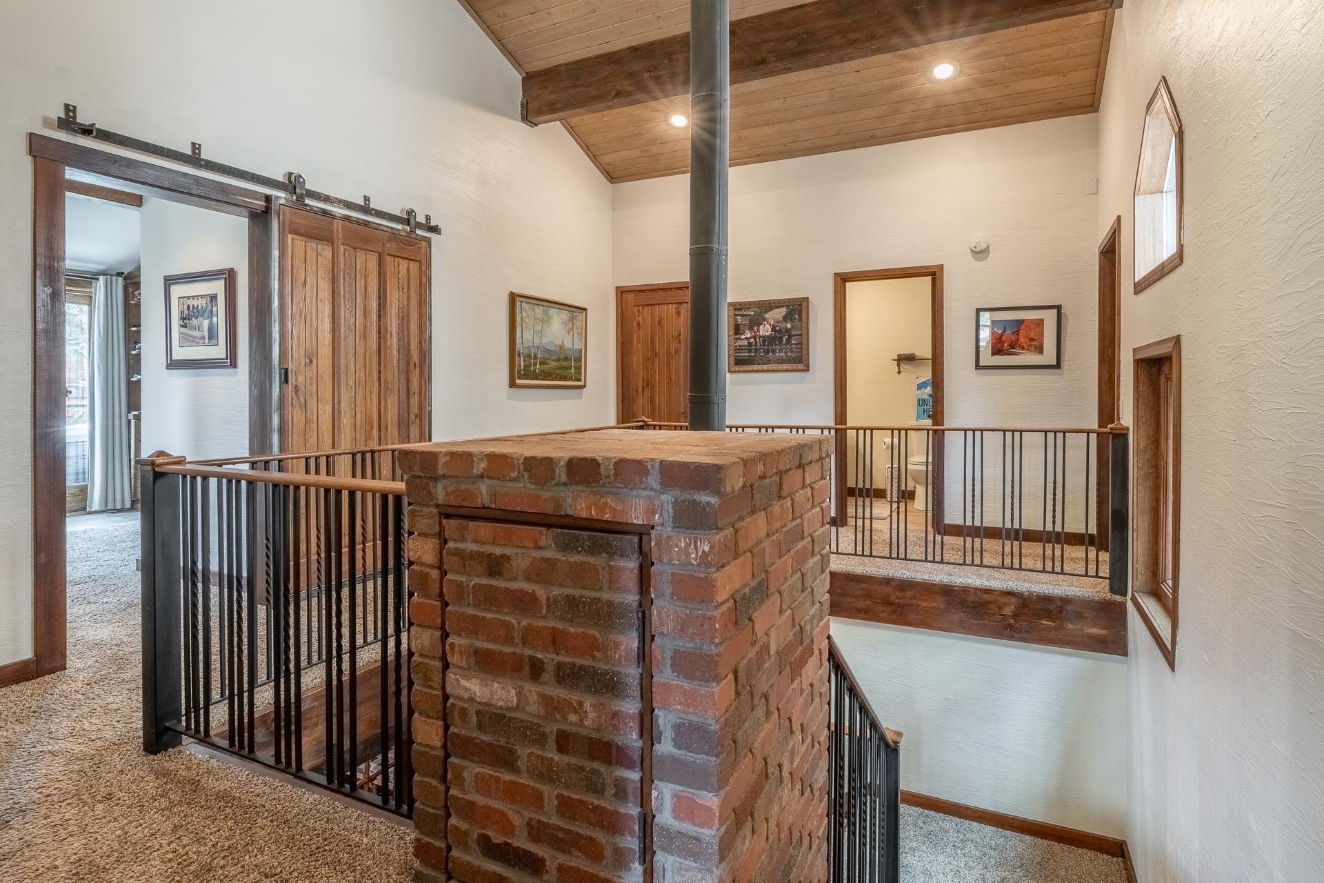 139 Ridgecrest Drive Mammoth Lakes, CA 93546 - Photo 41 of 65 Vaulted wood-paneled ceiling with exposed beams and dumbwaiter