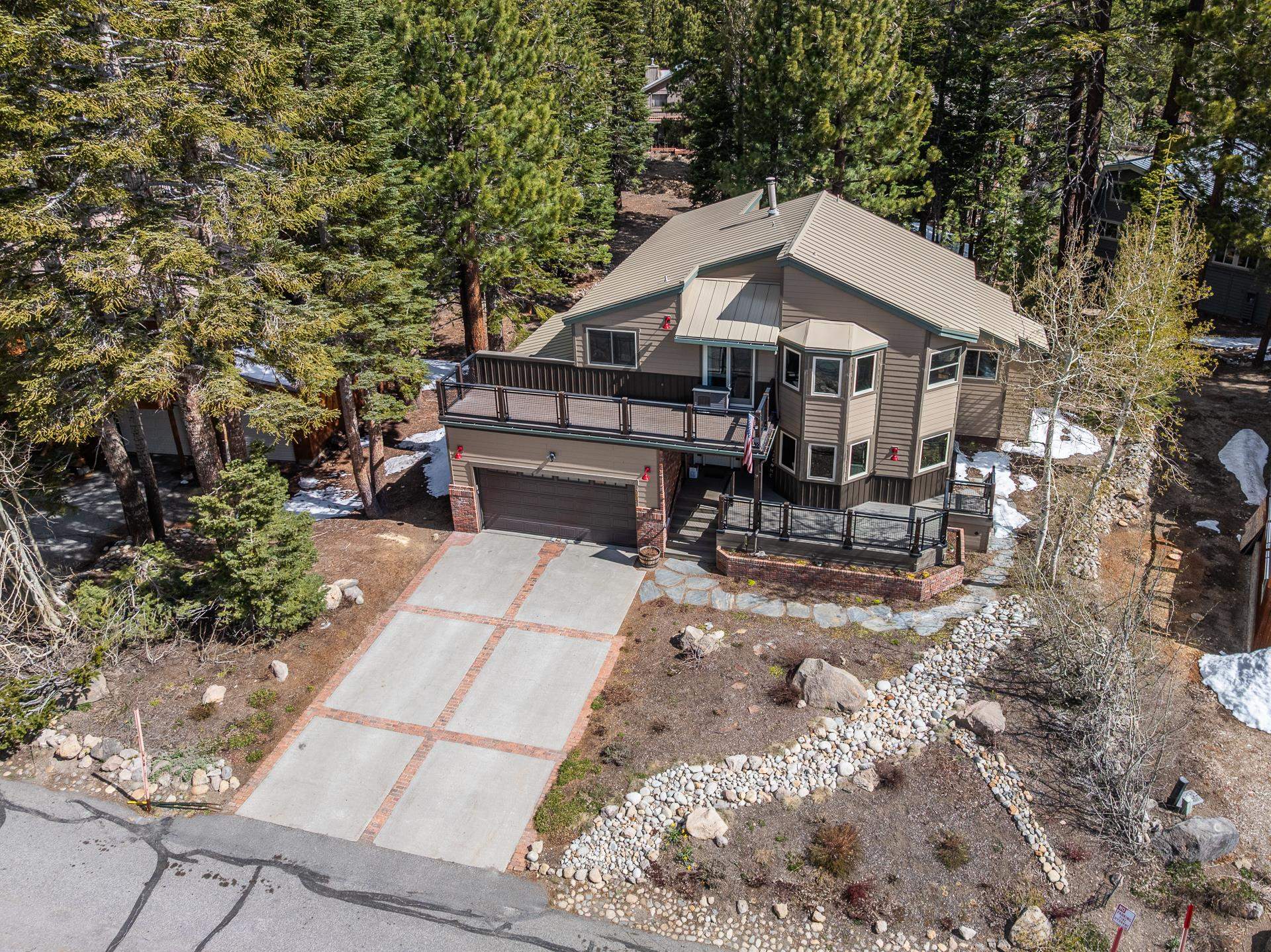 139 Ridgecrest Drive Mammoth Lakes, CA 93546 - Photo 54 of 65 Multi-level residence with metal roof, two-car garage, multiple exterior decks and large lot