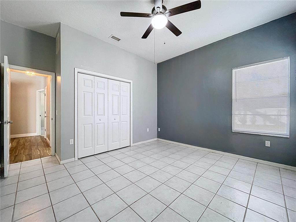 18812 Bascomb Lane Hudson, FL 34667 - Photo 42 of 57 a view of an empty room and window
