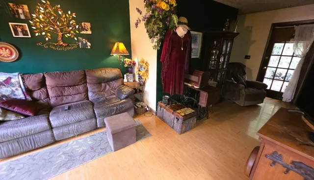 a room with furniture and a window