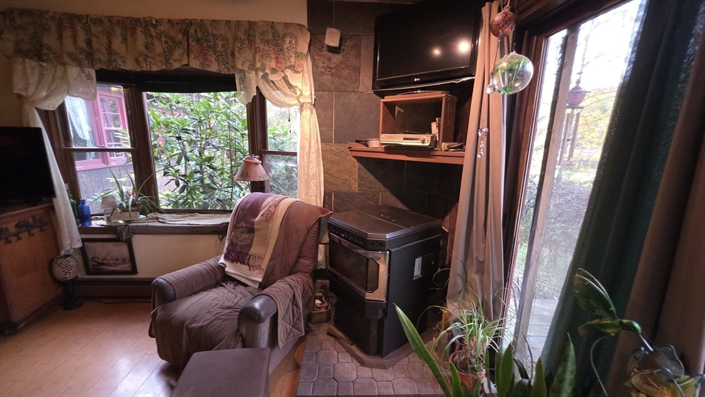 7 Hog Hollow Road Buckland, MA 01338 - Photo 15 of 22 a room with furniture and a window