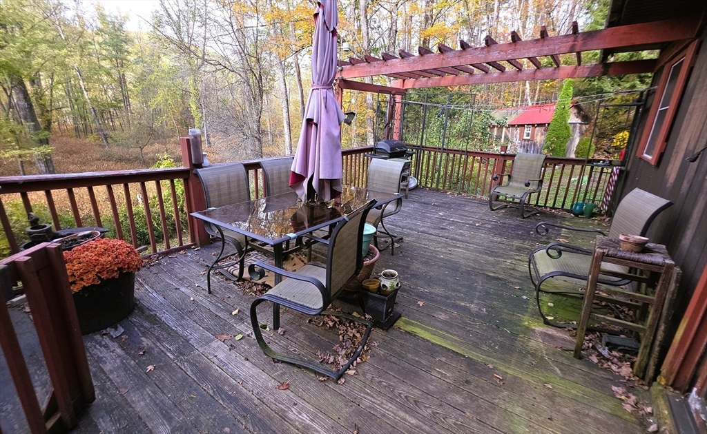 7 Hog Hollow Road Buckland, MA 01338 - Photo 17 of 22 a view of a chairs and table in the patio