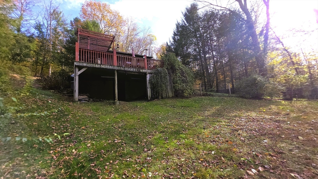 7 Hog Hollow Road Buckland, MA 01338 - Photo 20 of 22 a view of a house with a backyard