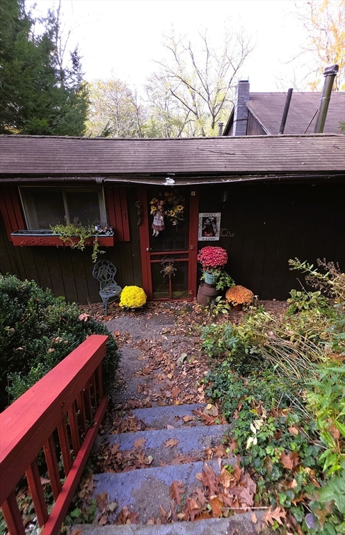 7 Hog Hollow Road Buckland, MA 01338 - Photo 3 of 22 a view of a back yard the patio and fire pit