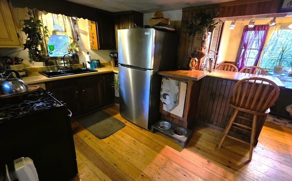 7 Hog Hollow Road Buckland, MA 01338 - Photo 6 of 22 a room with furniture and a fireplace