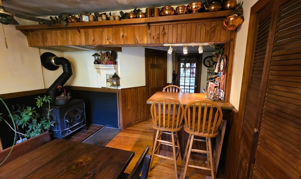 7 Hog Hollow Road Buckland, MA 01338 - Photo 8 of 22 a view of a balcony with furniture and wooden floor