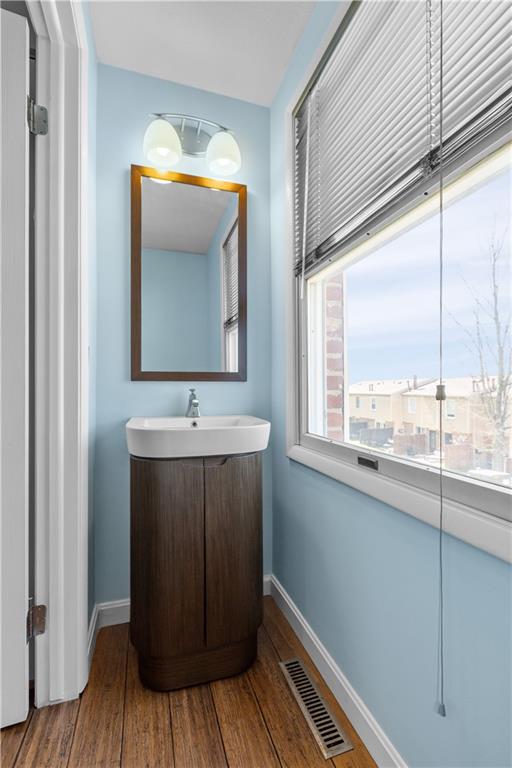 314 Quail Run Road Venetia, PA 15367 - Photo 16 of 19 Updated main-level powder room with modern vanity and stylish finishes.