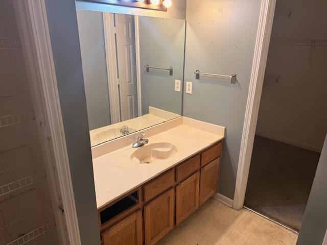 5407 Riverdale Road Memphis, TN 38141 - Photo 7 of 8 a bathroom with a sink and mirror