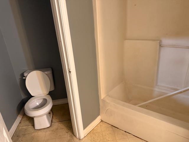 5407 Riverdale Road Memphis, TN 38141 - Photo 8 of 8 a bathroom with a toilet and a shower