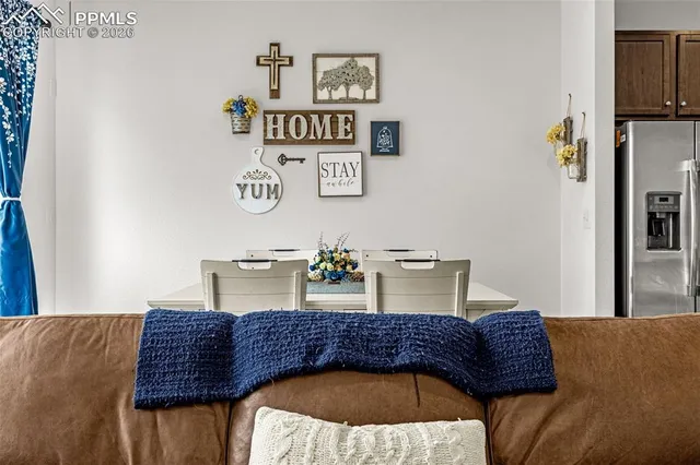 a living room with a couch and a table