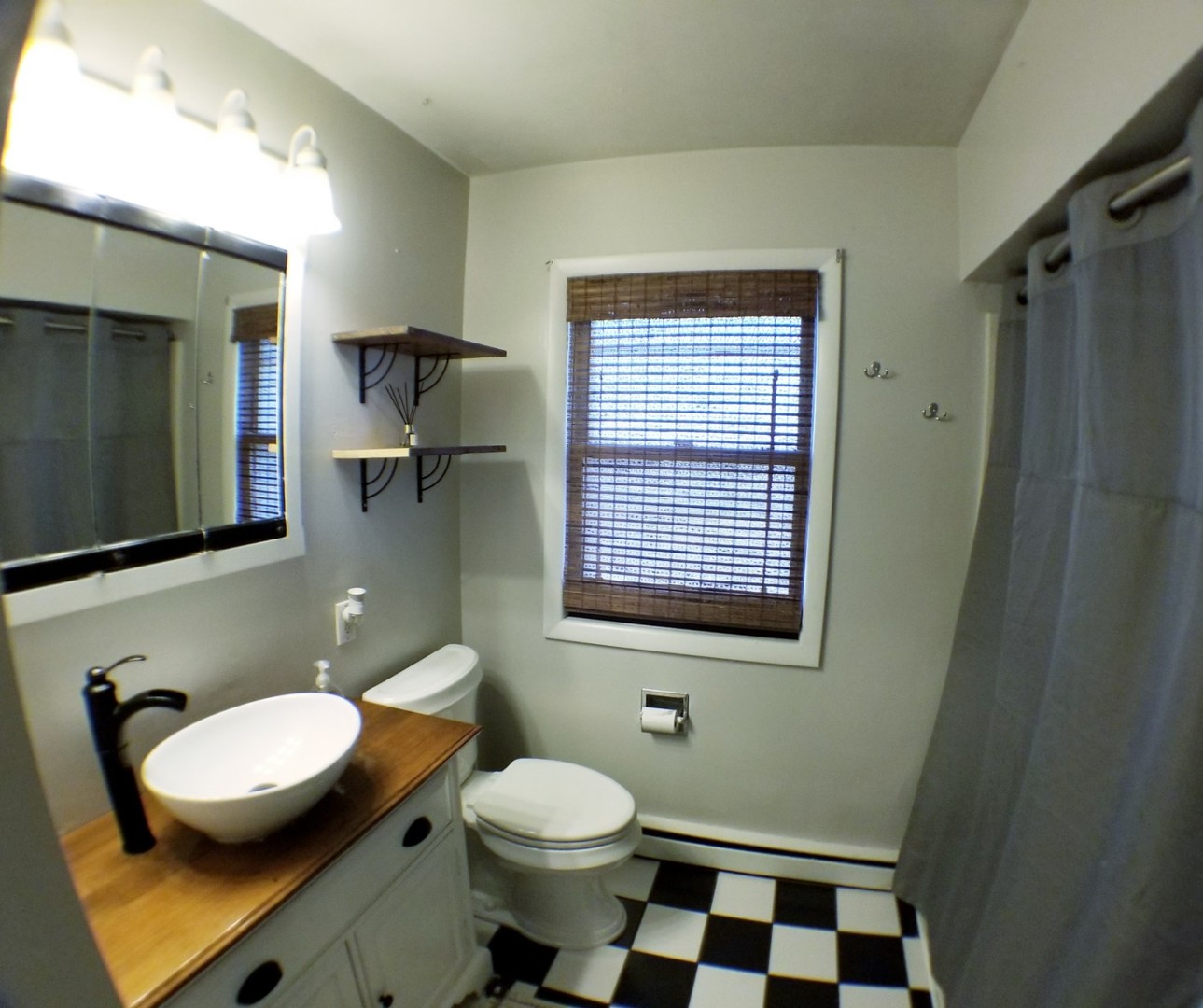 85 River Bluff Road Elgin, IL 60120 - Photo 16 of 26 a bathroom with a granite countertop toilet sink and mirror