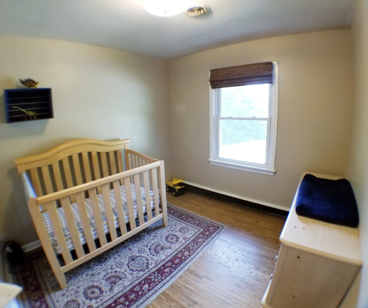 85 River Bluff Road Elgin, IL 60120 - Photo 17 of 26 a bedroom with a bed and window