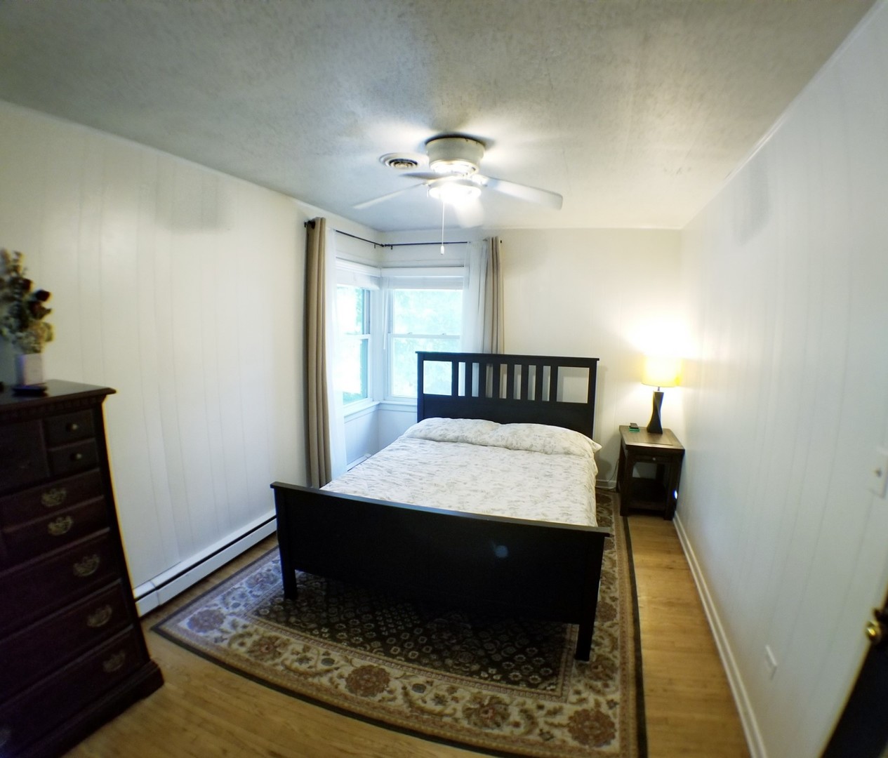 85 River Bluff Road Elgin, IL 60120 - Photo 21 of 26 a bedroom with a bed and window