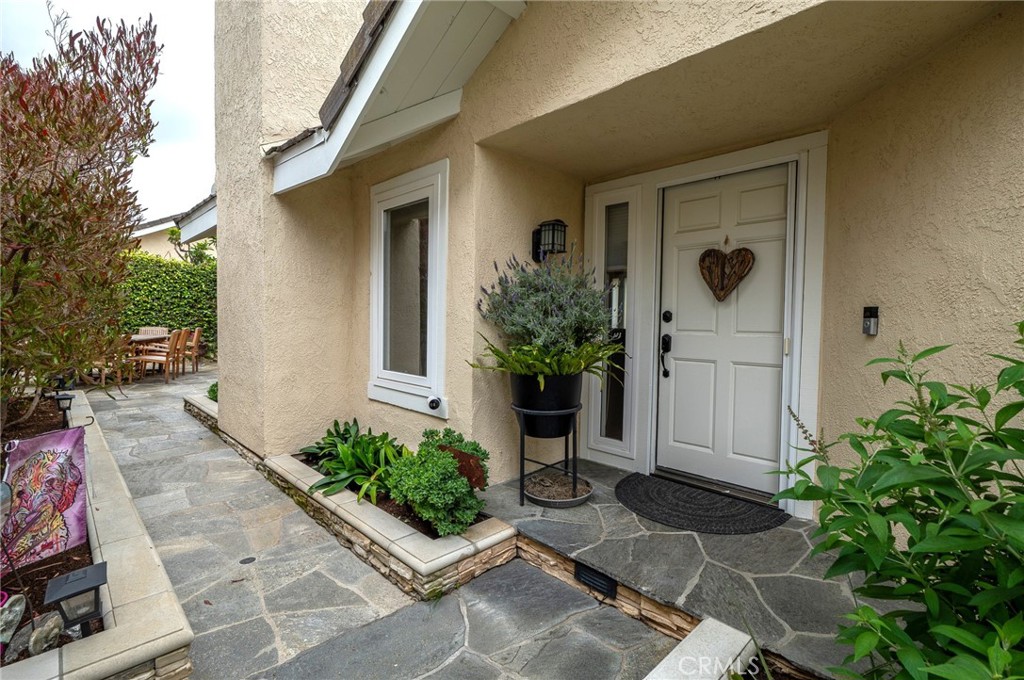 19 Windsong Irvine, CA 92614 - Photo 12 of 46 a view of a entryway door front of house