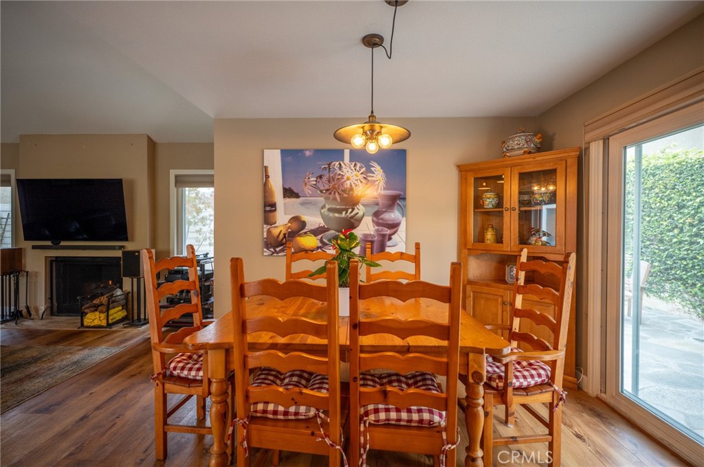 19 Windsong Irvine, CA 92614 - Photo 17 of 46 a view of a dining room with furniture window and wooden floor