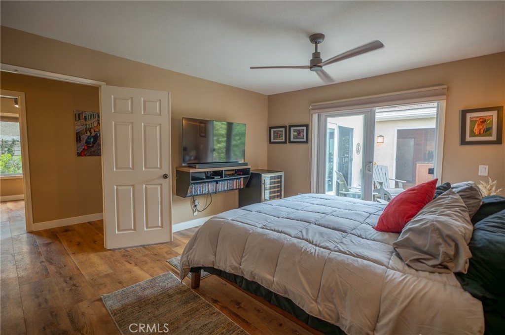 19 Windsong Irvine, CA 92614 - Photo 31 of 46 a bedroom with a bed and a flat screen tv