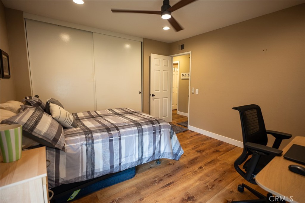 19 Windsong Irvine, CA 92614 - Photo 40 of 46 a bedroom with a bed a desk and chair
