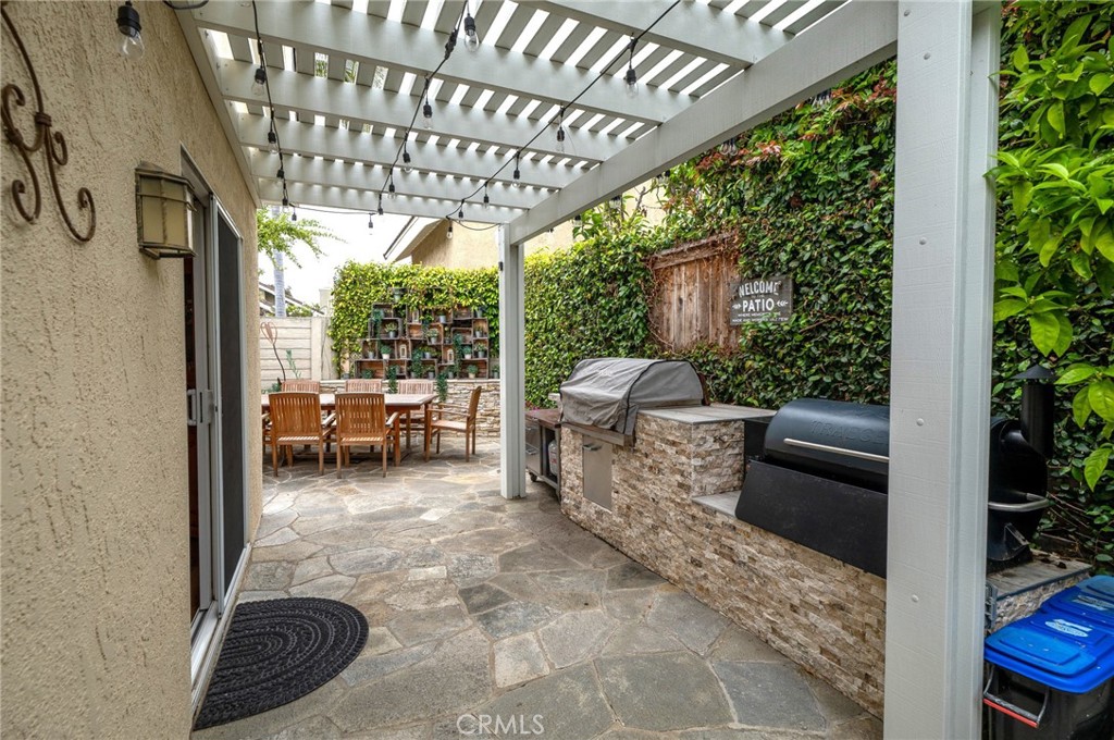 19 Windsong Irvine, CA 92614 - Photo 44 of 46 a view of a porch with furniture and a yard