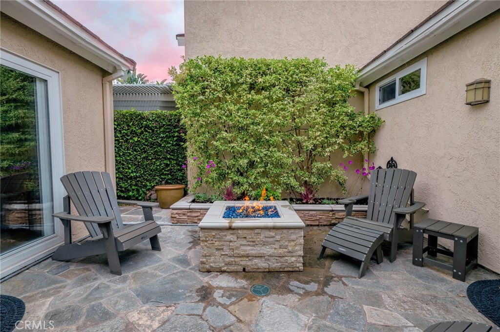 19 Windsong Irvine, CA 92614 - Photo 45 of 46 a outdoor space with the couches and a potted plant