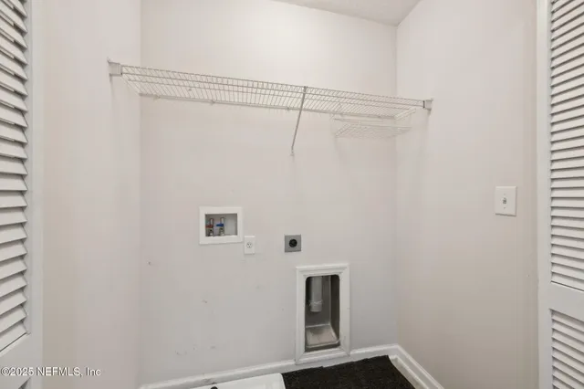 a view of a room with rack on the wall
