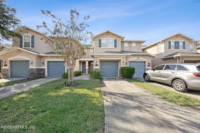 a house view with a garden space