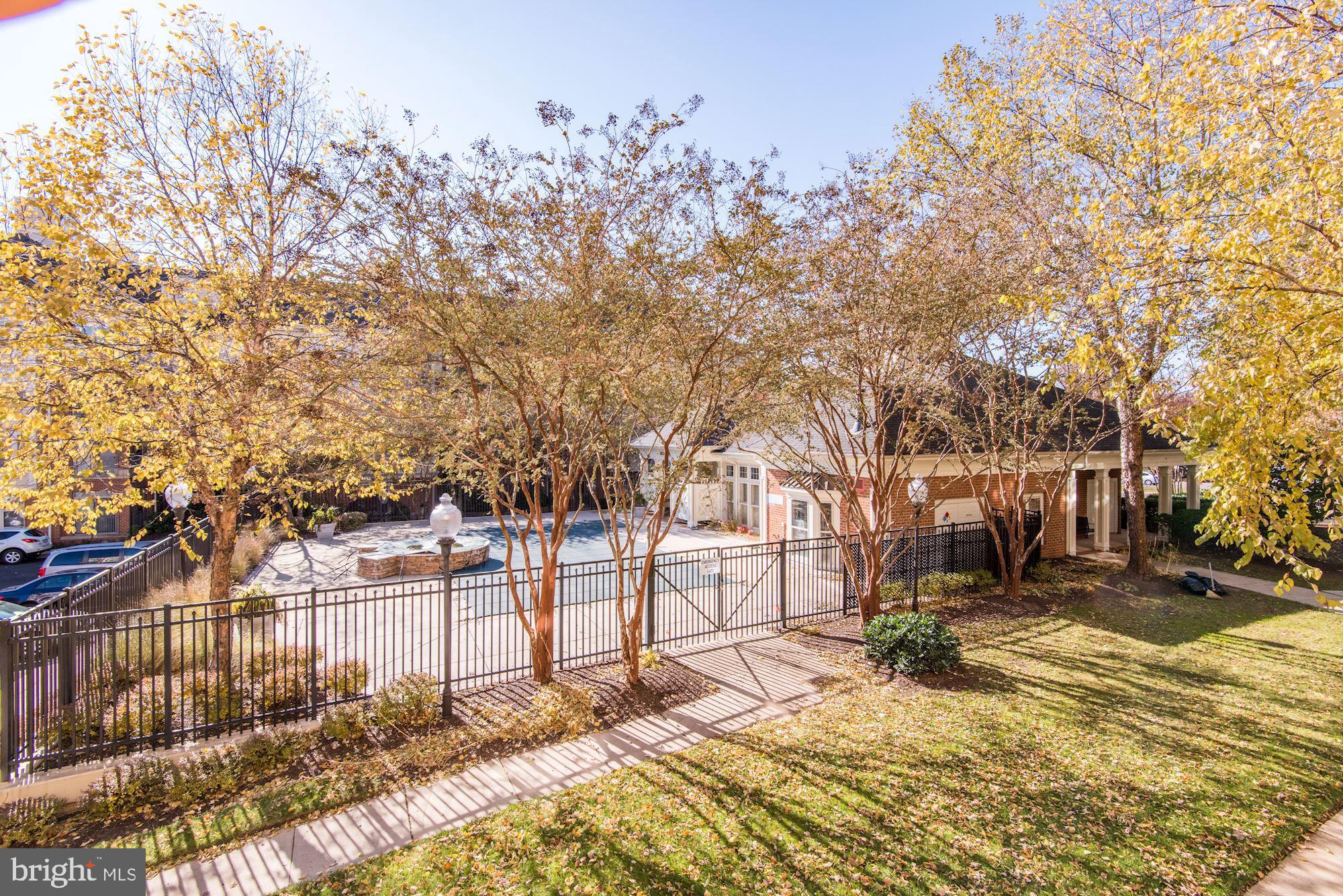 1860 Stratford Park Place, Unit 204 Reston, VA 20190 - Photo 40 of 41 a view of a yard covered in snow