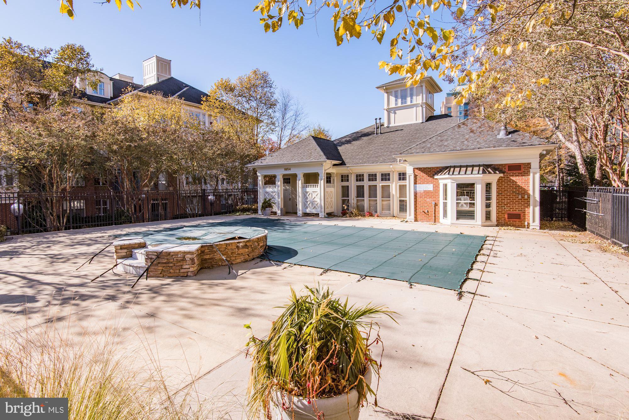 1860 Stratford Park Place, Unit 204 Reston, VA 20190 - Photo 41 of 41 a view of a house with a yard