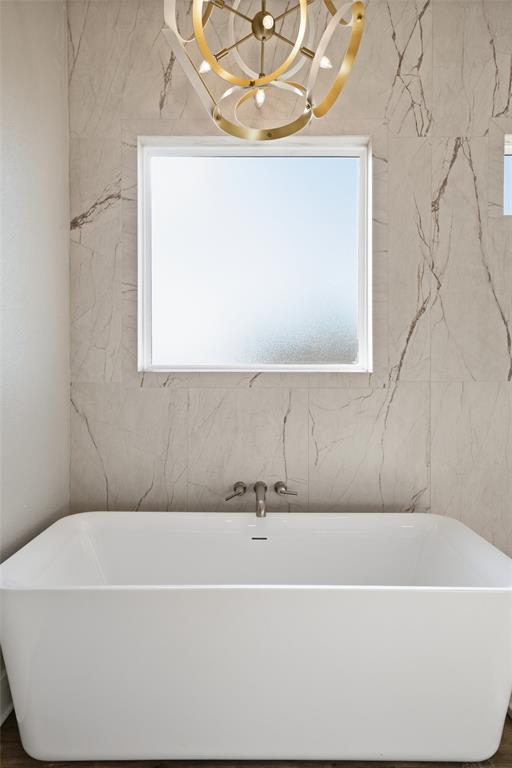348 Lacek Mill Road China Spring, TX 76633 - Photo 27 of 40 a bathroom with a bathtub