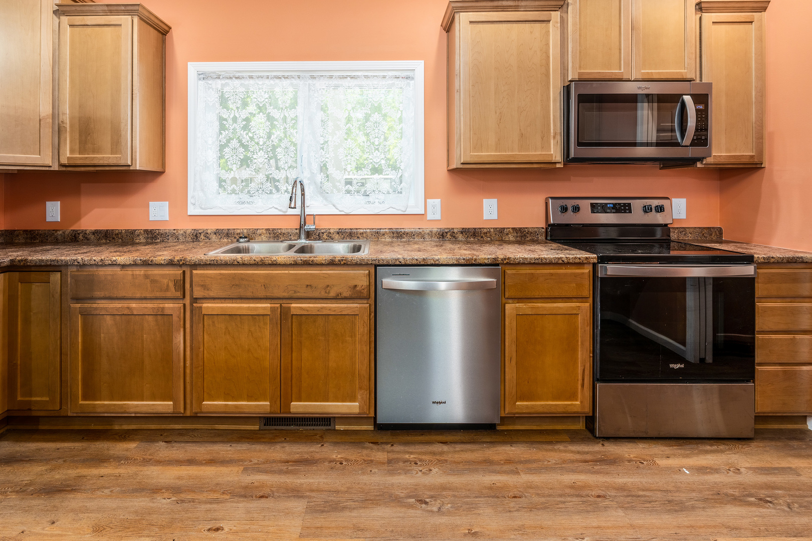 18562 East Hill Street Mount Vernon, IL 62864 - Photo 11 of 43 a kitchen with stainless steel appliances granite countertop a stove a sink and a microwave