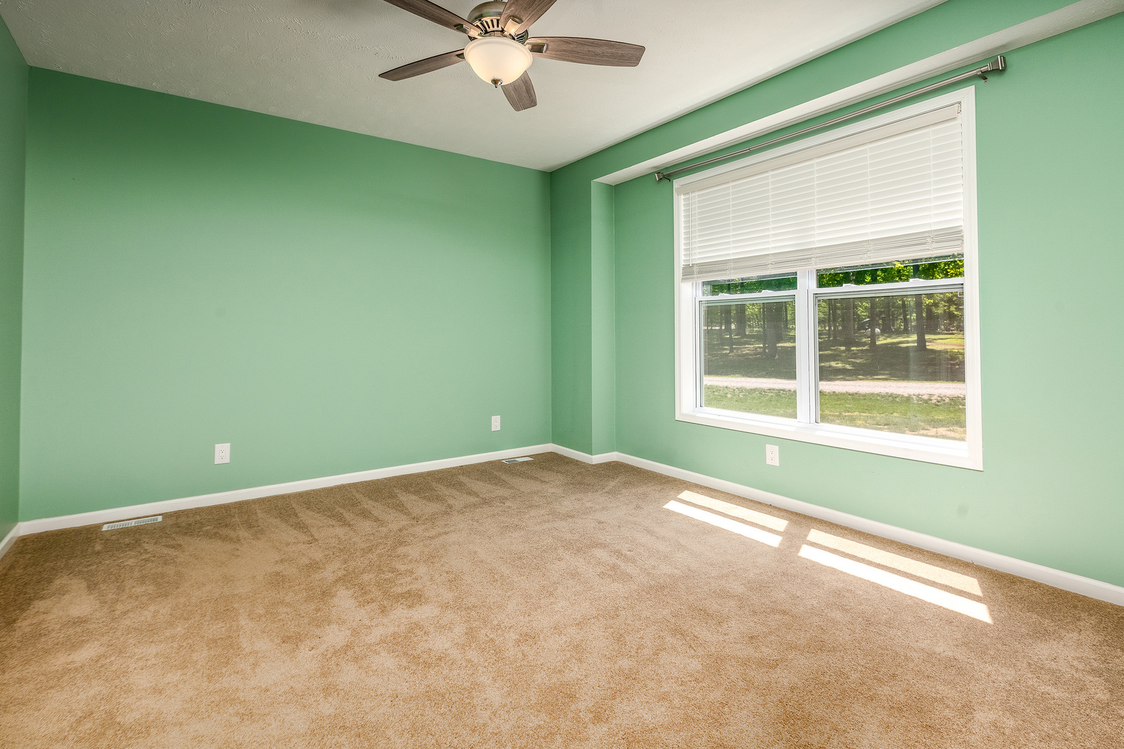 18562 East Hill Street Mount Vernon, IL 62864 - Photo 15 of 43 a view of an empty room with a window