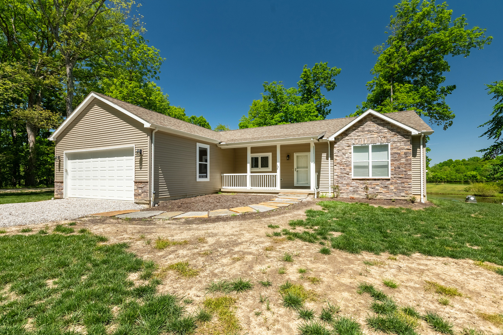 18562 East Hill Street Mount Vernon, IL 62864 - Photo 2 of 43 a front view of a house with a garden