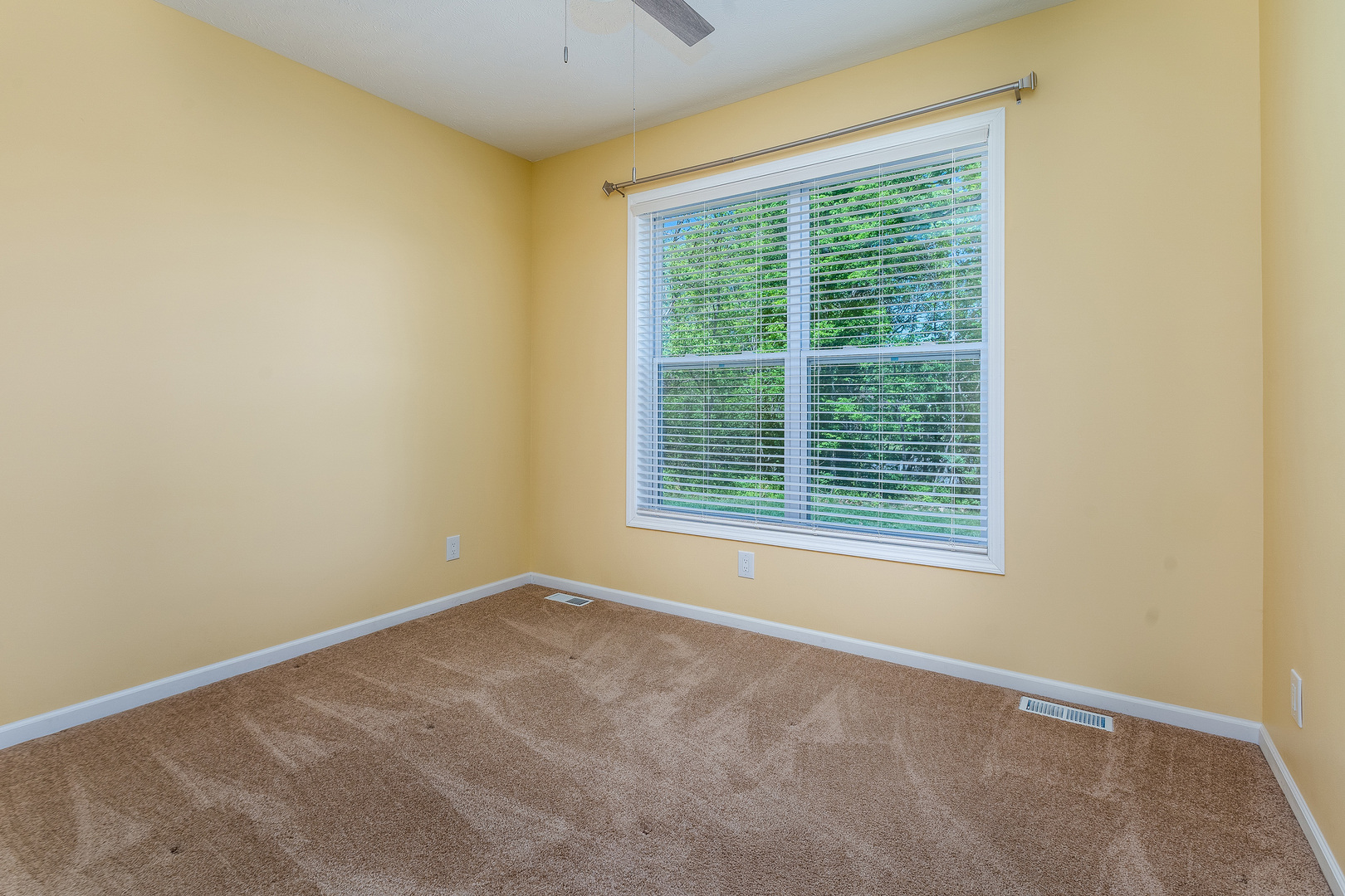 18562 East Hill Street Mount Vernon, IL 62864 - Photo 25 of 43 a view of an empty room with a window