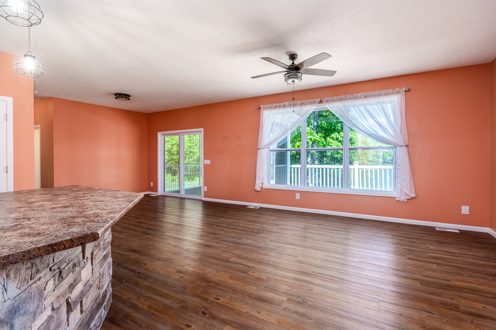 18562 East Hill Street Mount Vernon, IL 62864 - Photo 4 of 43 a view of empty room with wooden floor and fan