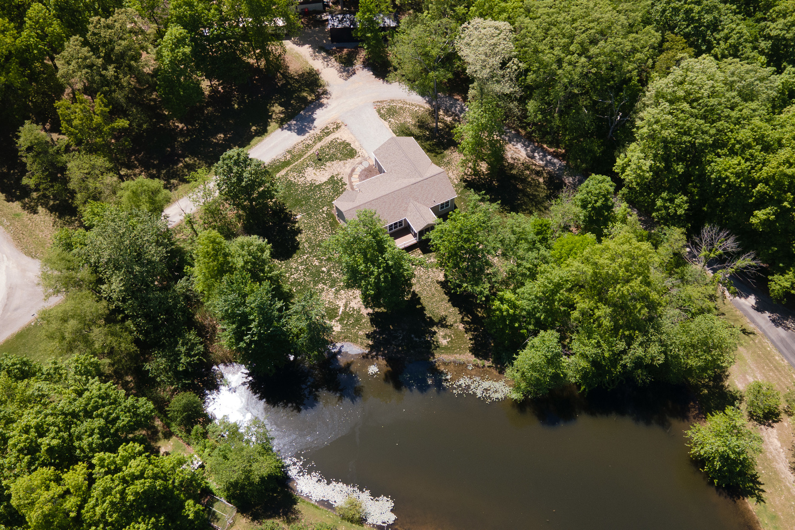 18562 East Hill Street Mount Vernon, IL 62864 - Photo 41 of 43 an aerial view of a house with a yard and lake view
