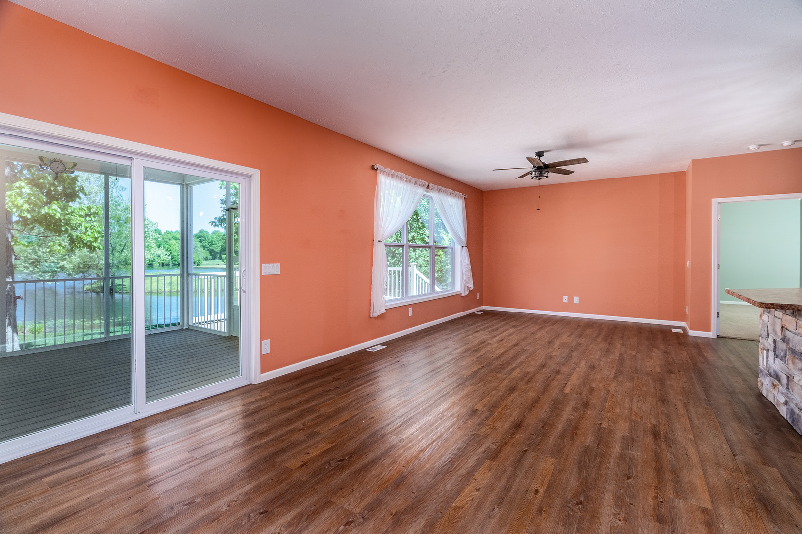 18562 East Hill Street Mount Vernon, IL 62864 - Photo 7 of 43 a view of empty room with wooden floor and fan