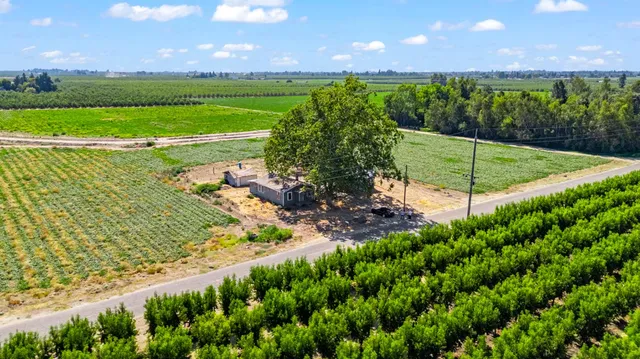 a view of a lake with a yard