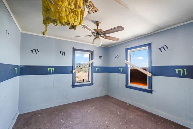 a view of a hallway view with wooden floor and staircase