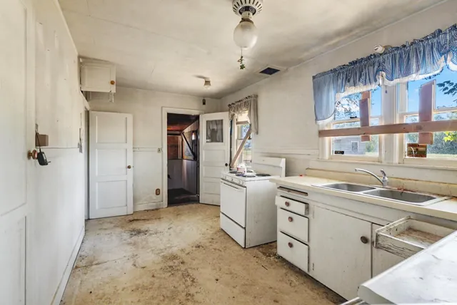 a view of a chairs and tables in the patio
