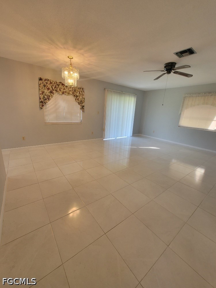 347 Richland Road Lehigh Acres, FL 33936 - Photo 4 of 16 a view of a livingroom with a window