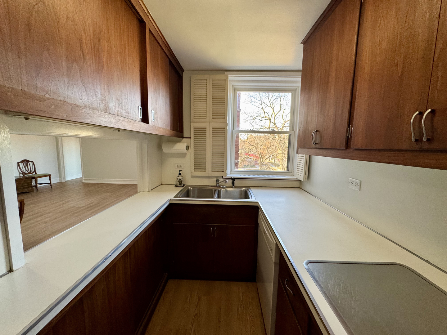 1585 Ridge Avenue, Unit 301 Evanston, IL 60201 - Photo 10 of 29 a kitchen with a sink a counter top space and cabinets