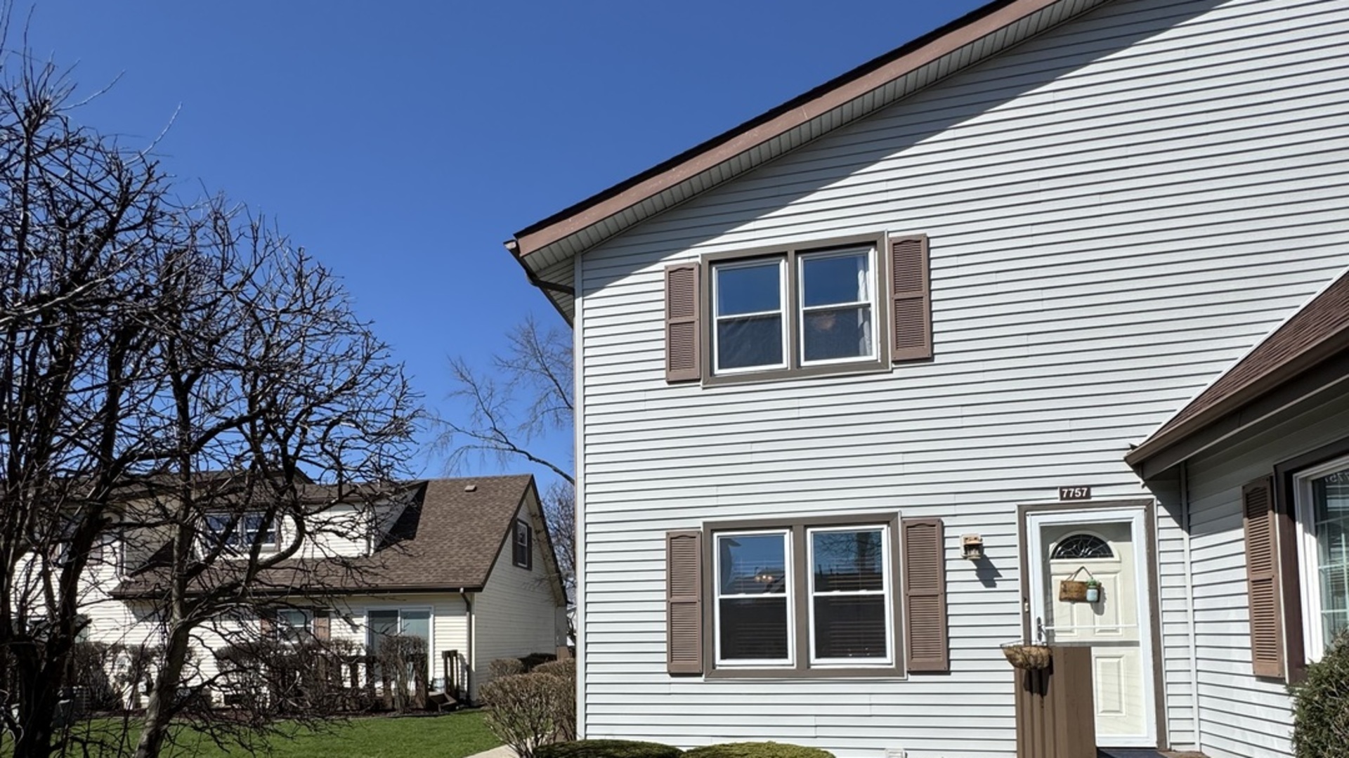a front view of a house with a porch