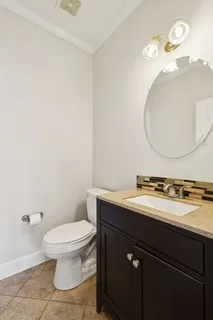 a bathroom with a bathtub a sink and a window